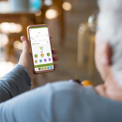 Woman using the mySugr app