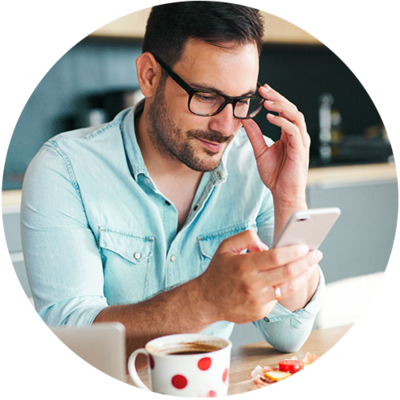 Person using their smartphone at home