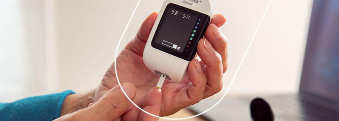 Checking blood sugar levels with Accu-Chek Instant meter