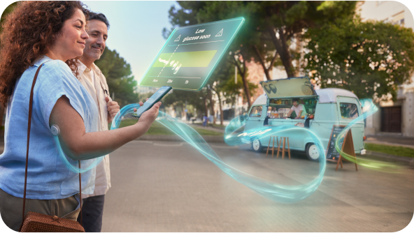 Image show person holding the Accu-Chek SmartGuide Predict app outside using the 30-minute Glucose Predict feature