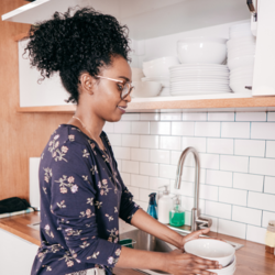 Lady organising her kitchen