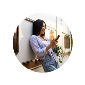 Lady looking at phone and smiling