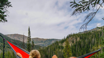 Lady sitting in a hammock