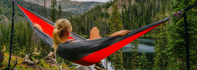 Lady sitting in a hammock