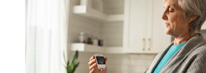 Lady monitoring her blood sugar levels